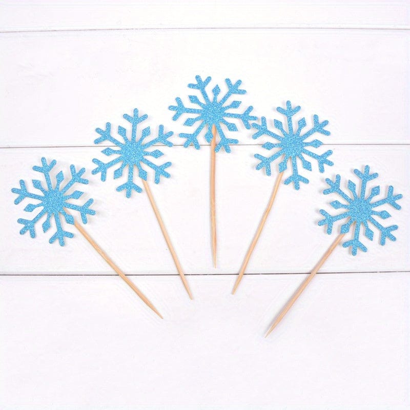 5 Lake blue Snow flake cake toppers on counter