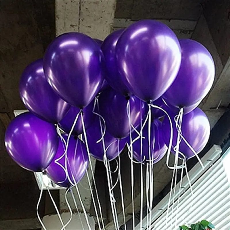 Purple 10 inch balloons on string outside
