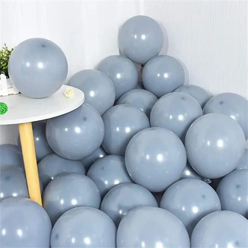 Gray 10 inch balloons in corner of room