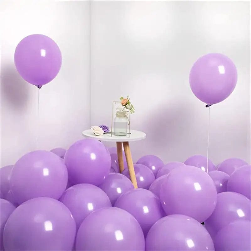 Light purple 10 inch balloons in corner of room