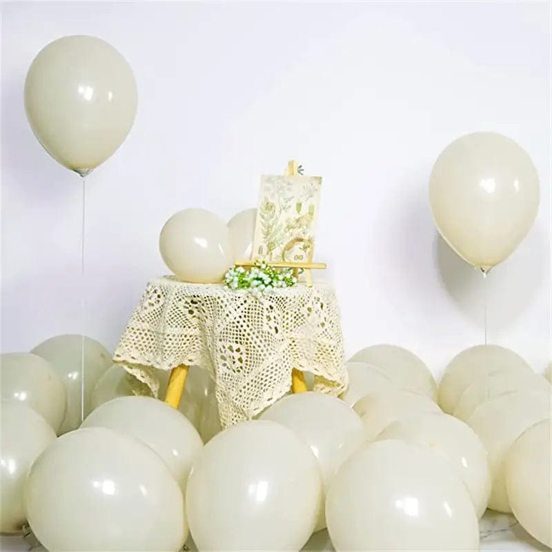 Ivory 10 inch balloons in corner of room