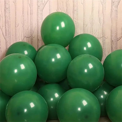 Dark Green 10 inch balloons in corner of room