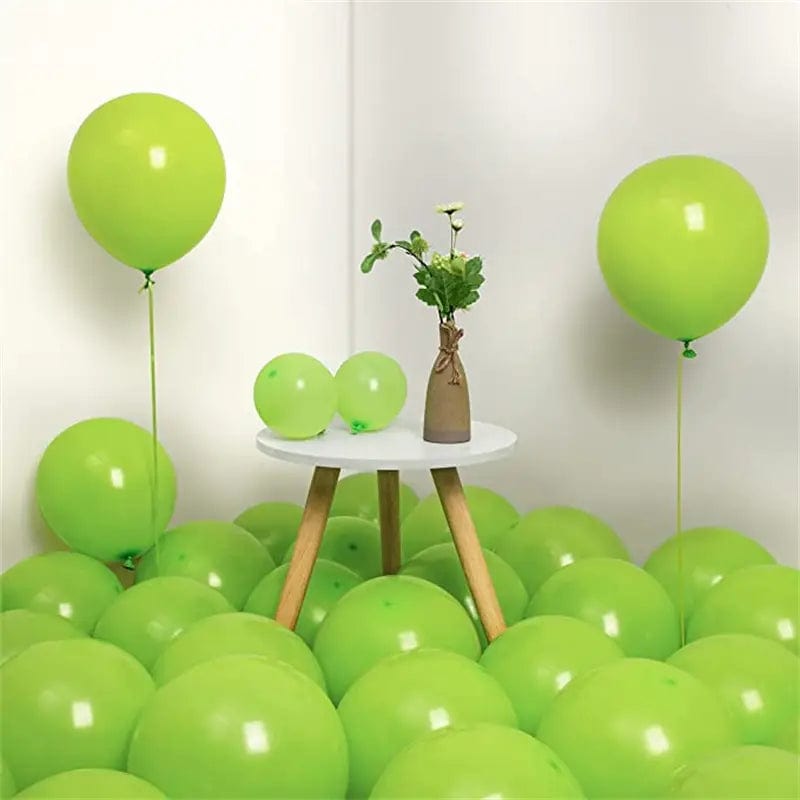 Fruit Green 10 inch balloons in corner of room