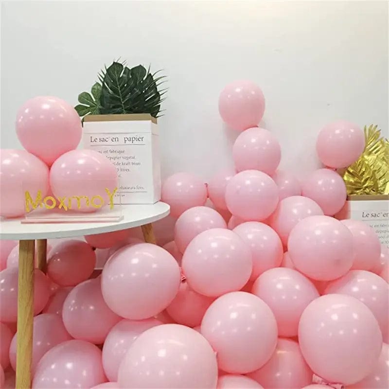 Macaron Pink 10 inch balloons in corner of room