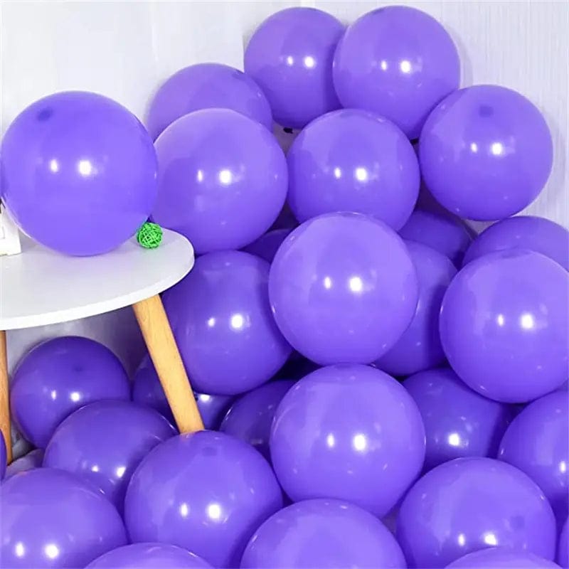 Purple 10 inch balloons in corner of room