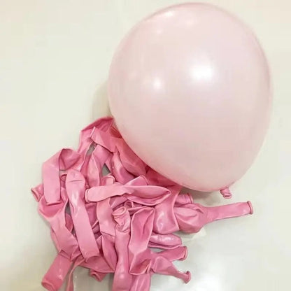 macaron pink balloons with one blown up