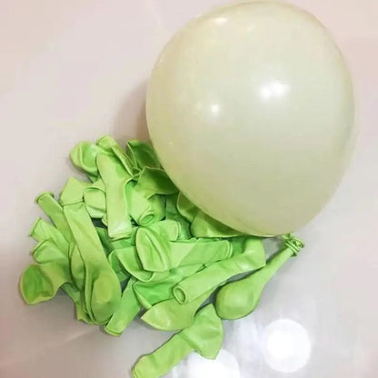 macaron green balloons with one blown up