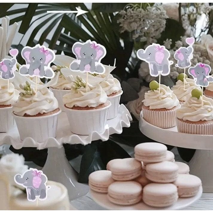 baby girl elephants on cupcakes with pink cookies underneath