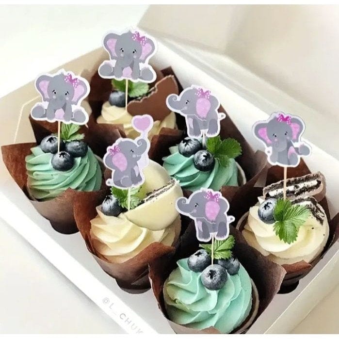 6 baby girl elephants on cupcakes