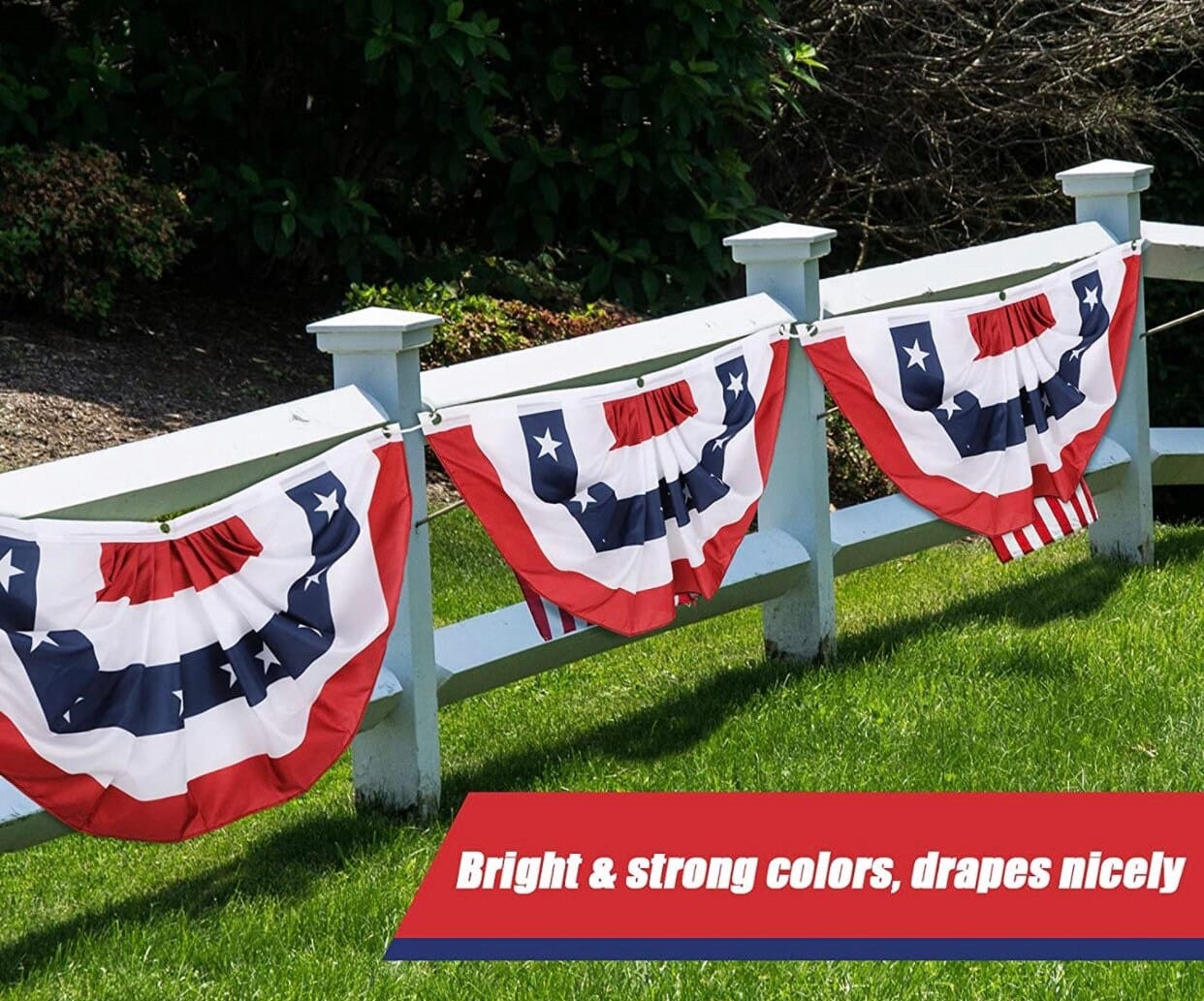 3 pleated red white and blue bunting flags on a fence line
