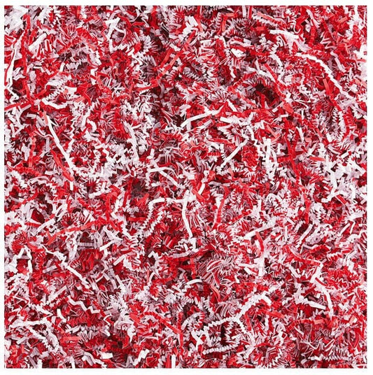 close up of red and white crinkle cut shredded paper