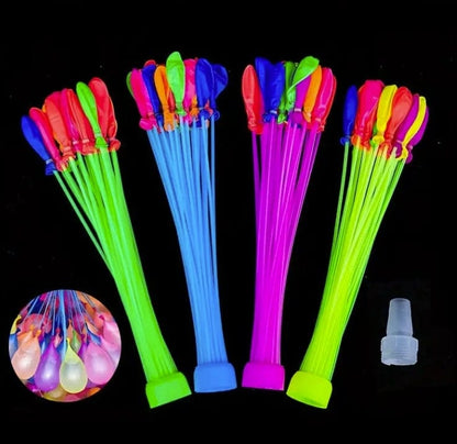 4 sets of water balloons laying on black table
