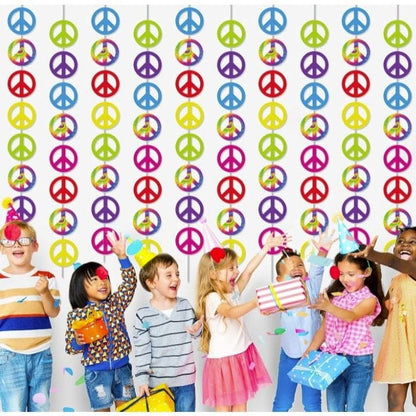 tie die peace sign garland hanging with kids celebrating in front of it