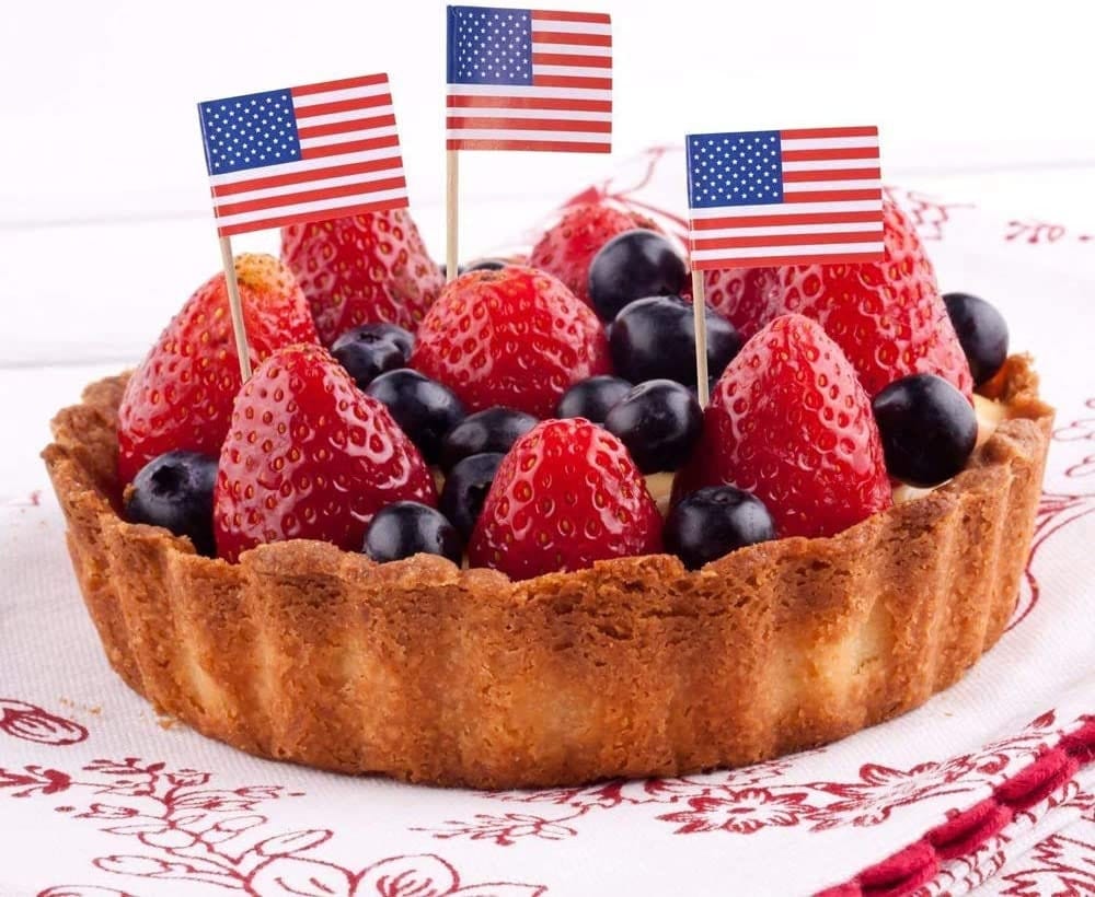 3 Mini USA Flag picks in a fruit cake