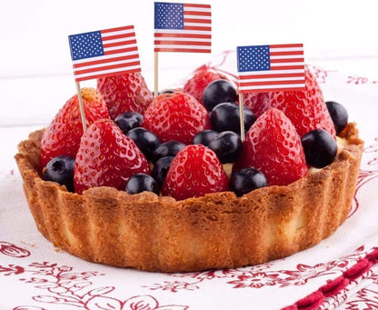 3 Mini USA Flag picks in a fruit cake