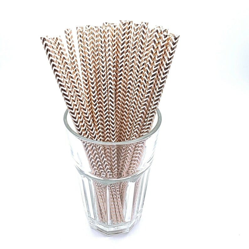 Wavy Rose Gold Metallic Paper straws in a cup